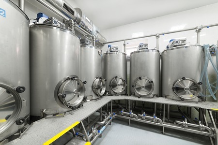 Metal tanks, modern production of alcoholic beverages.の写真素材