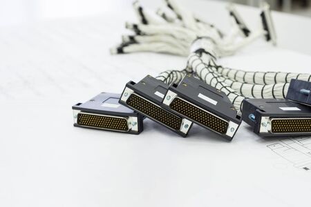 A bundle of cable harnesses lies on the table.の写真素材