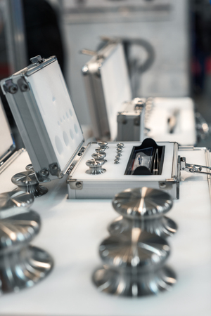 A set of laboratory weights. High-precision weights for standard weight measurements. Laboratory equipment.の写真素材