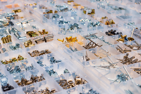 Many screws arranged as backgroundの写真素材