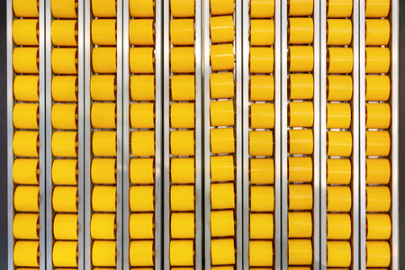 Flat roller table. Roller conveyor close-up.の写真素材