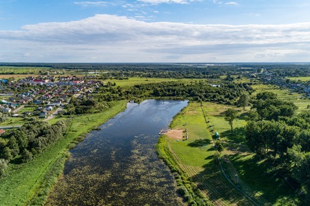 An artificial lake near a small town, a view from a high point