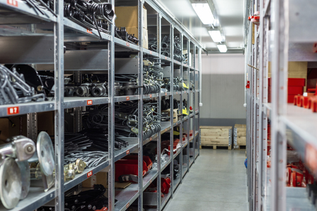 Factory warehouse spare parts. Storage and distribution of componentsの写真素材