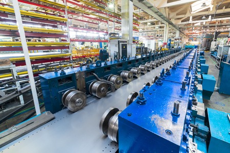 Roller forming machine. The interior of the plant producing a metal profile.の写真素材
