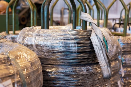 Industrial warehouse of cold rolled wire. The wire coils are stacked off the stack
