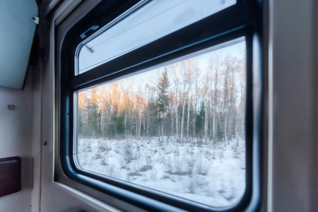 View of the window of a moving passenger train.の写真素材
