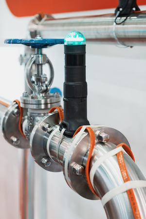 Pipe equipped with a heating system. Electrical tape heaterの写真素材