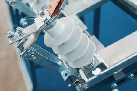 High voltage electrical connector. Metal fittings and ceramic insulatorsの写真素材