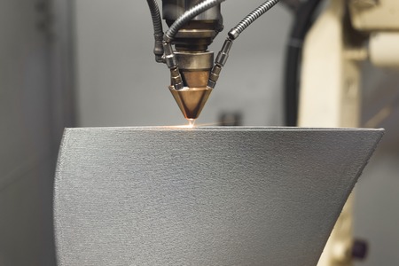 3D metal printer produces a steel part.の写真素材