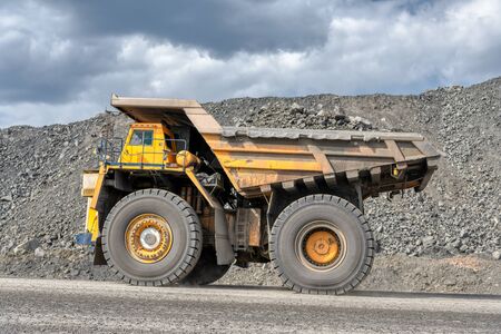 Large quarry dump truck. Transport industry.