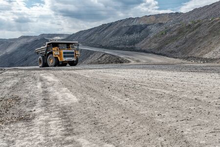 Quarry truck carries coal mined.