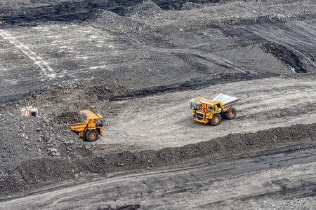 Large quarry dump truck. Transport industry.