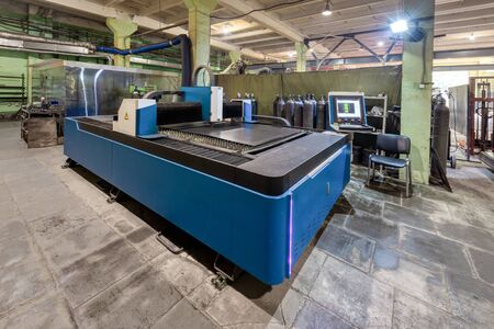 The machine for laser cutting of metal makes the cutting of a metal sheet.