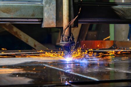 Plasma cutting machine cuts large and thick steel sheets.