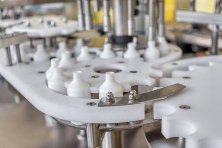 Automatic line for filling and labeling drugs.