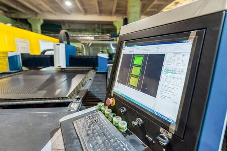 cnc machine control panel for laser cutting of metal makes the cutting of a metal sheet.の写真素材
