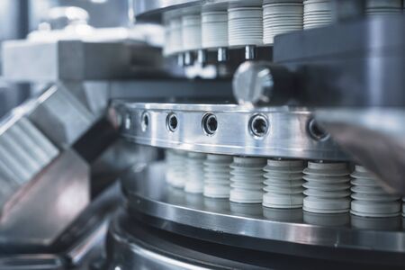 Automatic machine for filling ampoules and vials. Modern pharmaceutical equipment.
