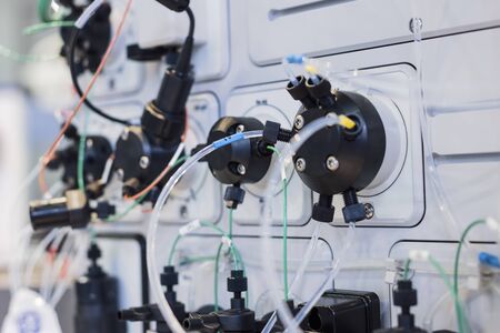 Research equipment, gas chromatograph. Scientific machine for studying the composition of a substance. Thin tube of many connected to the system.の写真素材