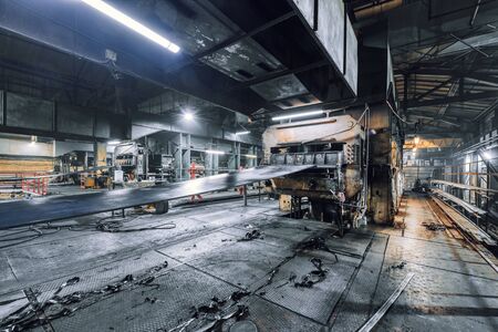 Large press for sintering rubber bands. Factory for the production of rubber conveyor belts.の写真素材