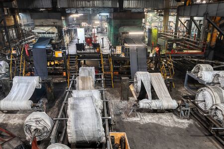 Factory manufacturing rubber conveyor belts.