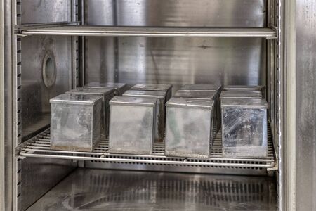 Metal molds for pouring concrete samples.の写真素材