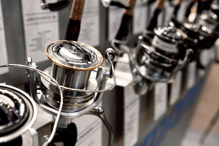 A variety of fishing reels. Fishing gear and accessories.