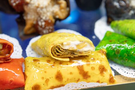 Traditional Russian pancakes with filling. Pancakes are filled with cottage cheese.