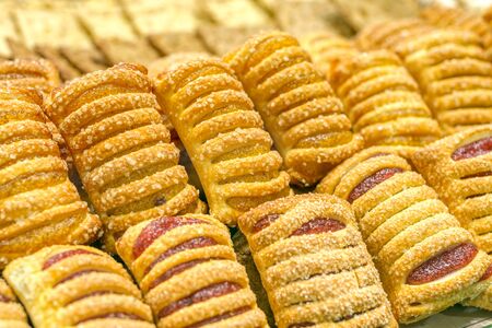 Sweet pastries sugar muffins with jam.の写真素材