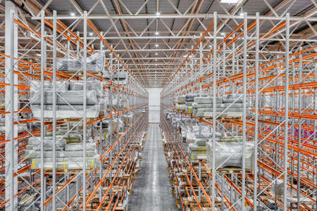 Large warehouse. Tall metal shelves