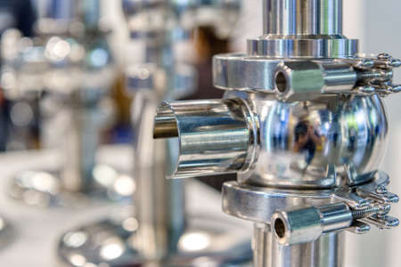 Stainless steel pipes and valves. Industrial pipeline system.