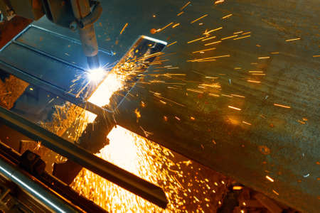 CNC plasma cutting machine cuts a metal sheet