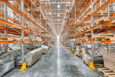 Large warehouse. Tall metal shelvesの写真素材