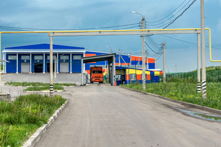 A garbage truck is weighed at a household waste recycling plant