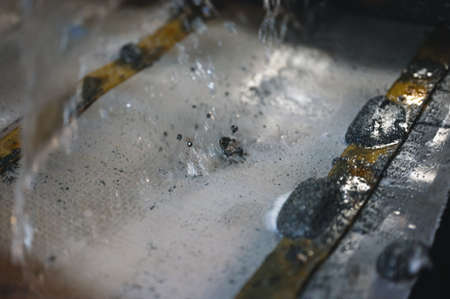 Vibrating screen, ore washing with liquidの写真素材