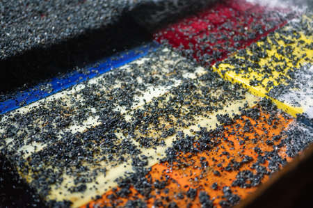 Vibrating screen, ore screening. Lots of small stones on the surface of the sieveの写真素材