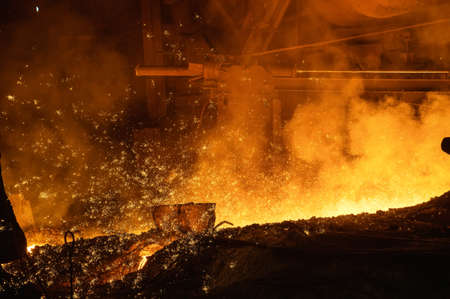 Molten metal flows through the channel. Blast furnace metal release,の写真素材