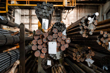 Hot rolled steel, bundle of round metal rods close-upの写真素材
