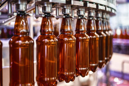 Fragments of automatic filling machine for filling various drinksの写真素材