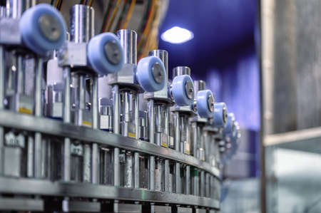 Fragments of automatic filling machine for filling various drinks