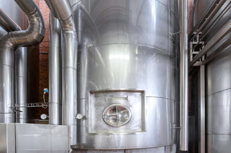 Large yeast fermentation tanks. Industrial production of beerの写真素材