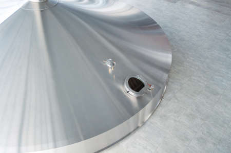 Mash vats of a brewery. Large metal fermentation tanks