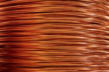 Shiny winded copper cable in warehouse of production plant