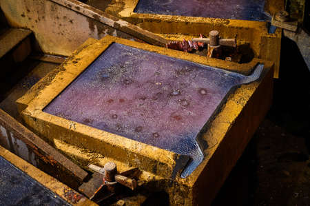 Copper ingot in anode casting form in metal melting workshopの写真素材