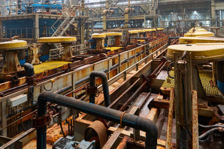 Floatation machines operate with mineral ore at factory