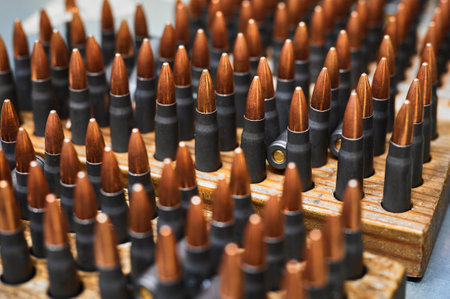 Riffle bullets in wooden racks in production plant workshopの写真素材