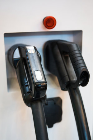 Charging station for electric cars with plugs close viewの写真素材