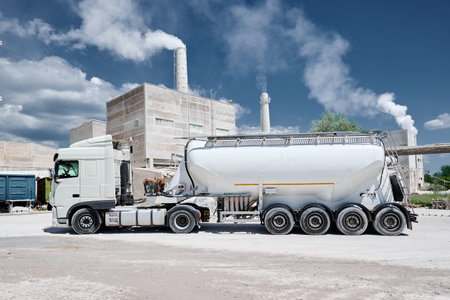 Vehicle for lime cement and flour against smoking chimneysの写真素材