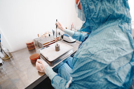 Technician works on special project examining test samples