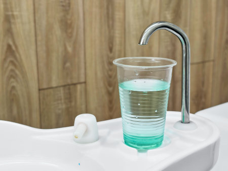 Refreshing dental water station ready for patient use in a modern clinic environment