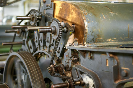 Exploring the intricate mechanics of a carding machine with its engaging assembly and dynamic functionalityの写真素材